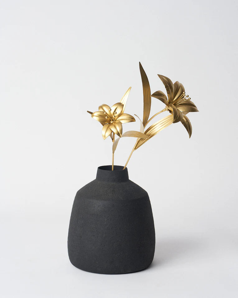 Pair of gold Lily Accent Pieces arranged in a dark vase.