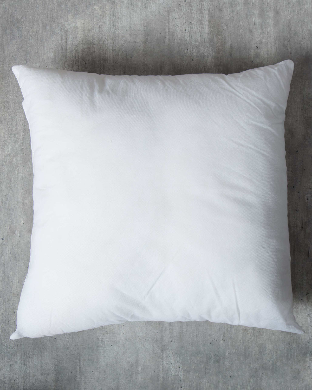 Overhead view of a white Sham Filler 61 x 61 cm.