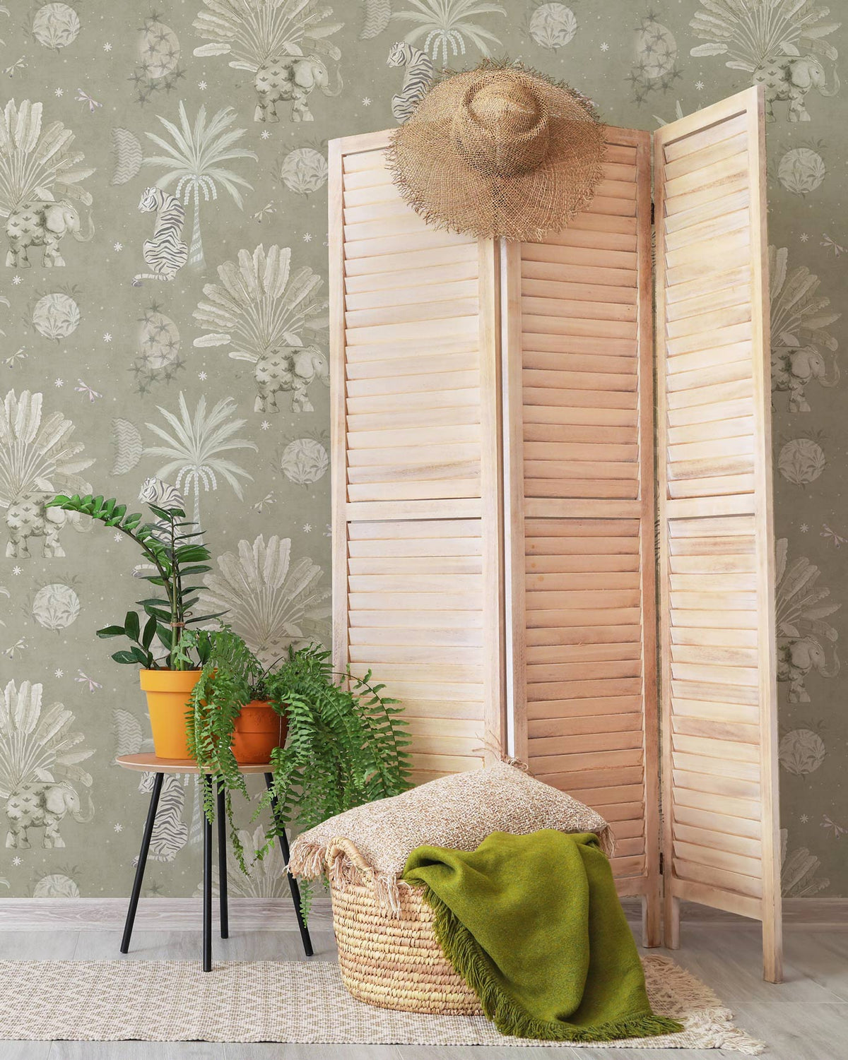 Moonrise Island wallpaper in a room with a wooden screen and plants.