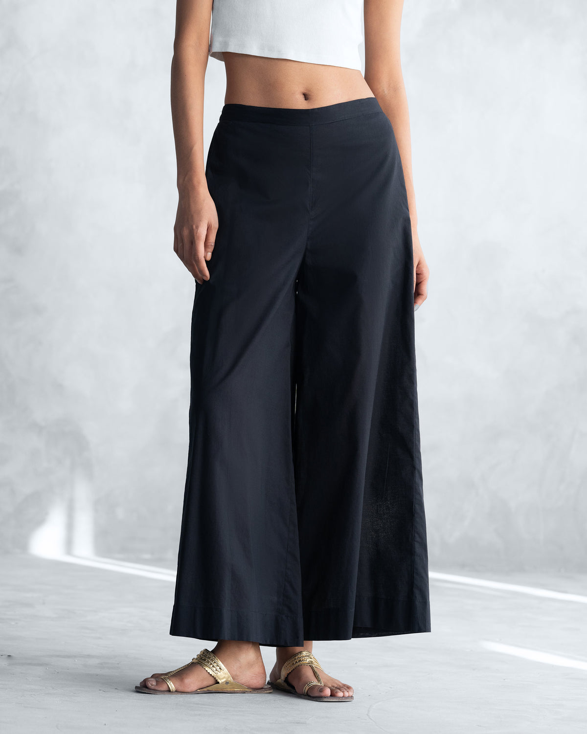 Black Basic Pyjamas wide-leg trousers from the front.