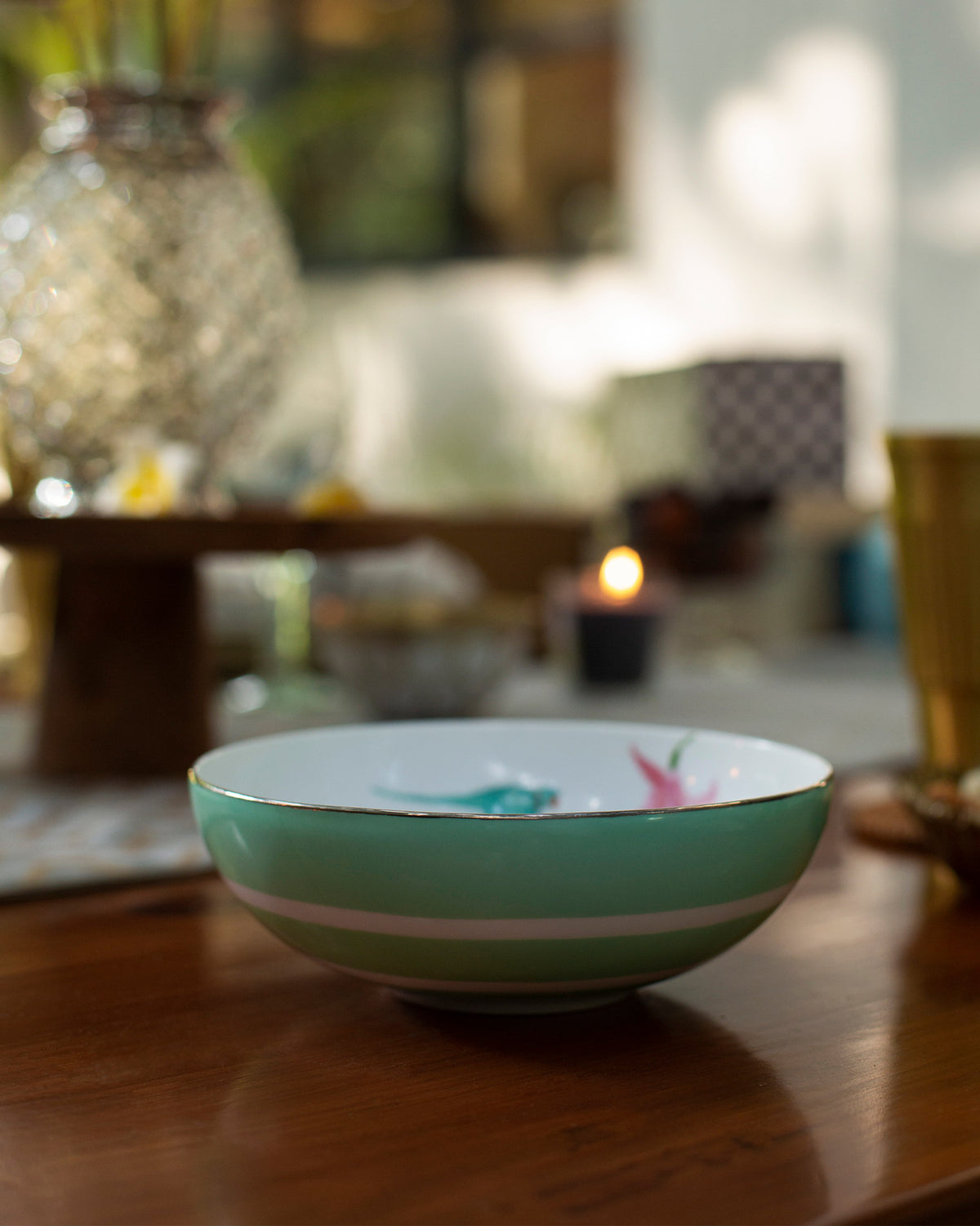 Botanical Serving bowl small in green with a bird motif inside.