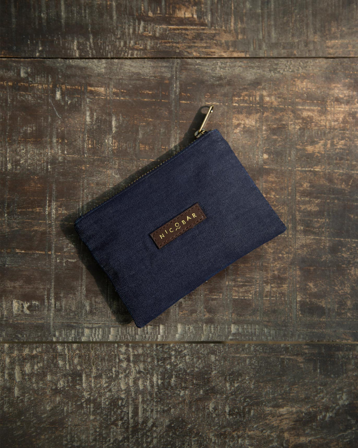 Starry Night ID Pouch in denim blue with a brown NICOBAR tag.
