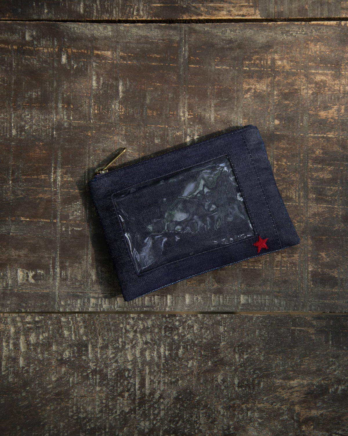 Starry Night ID Pouch in denim blue with a clear ID window and a red star.