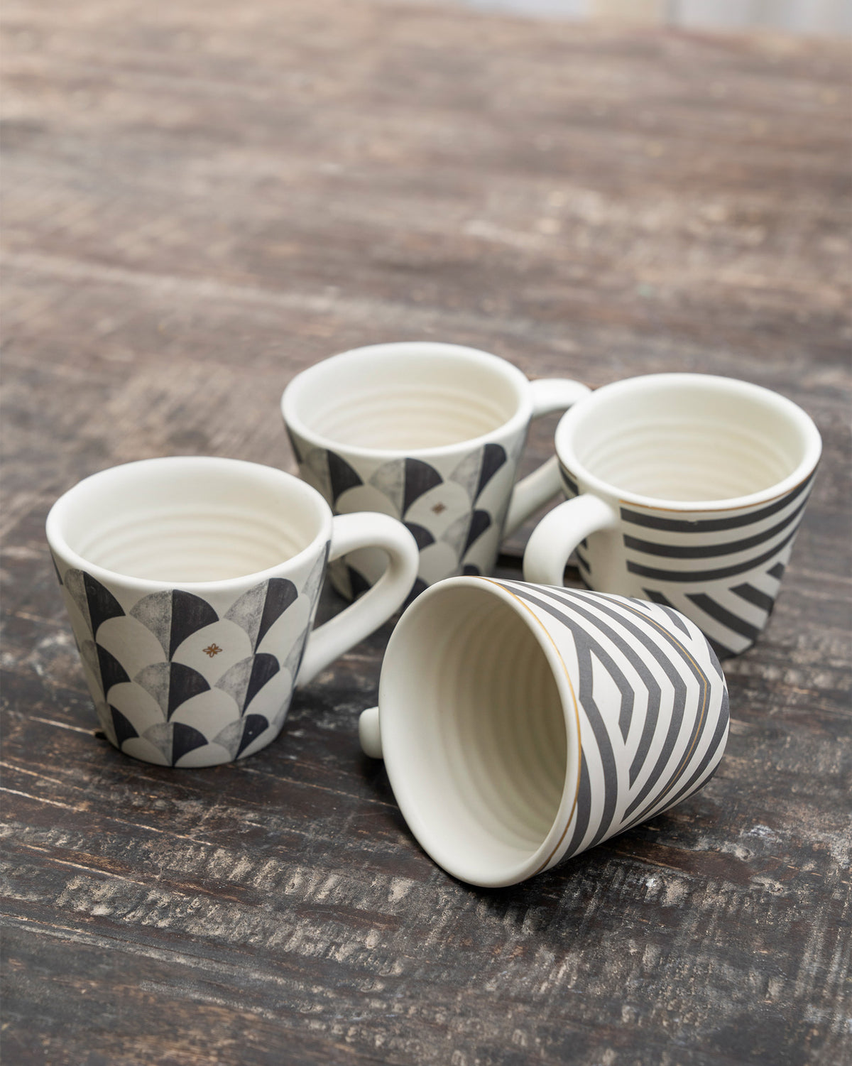 Khardung espresso mug set with one mug tipped to show the interior.