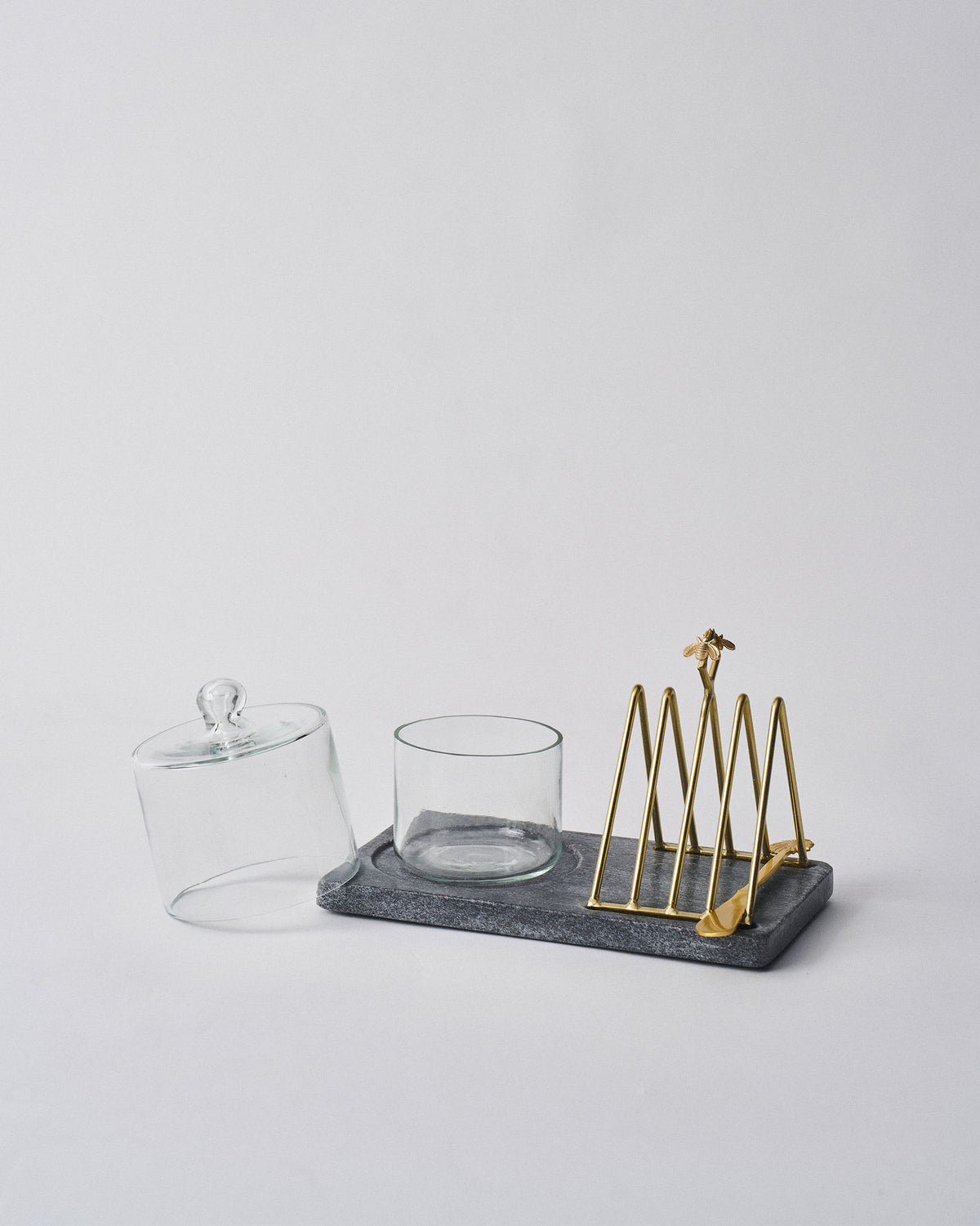 Mahi breakfast tray beside its clear glass butter cloche.