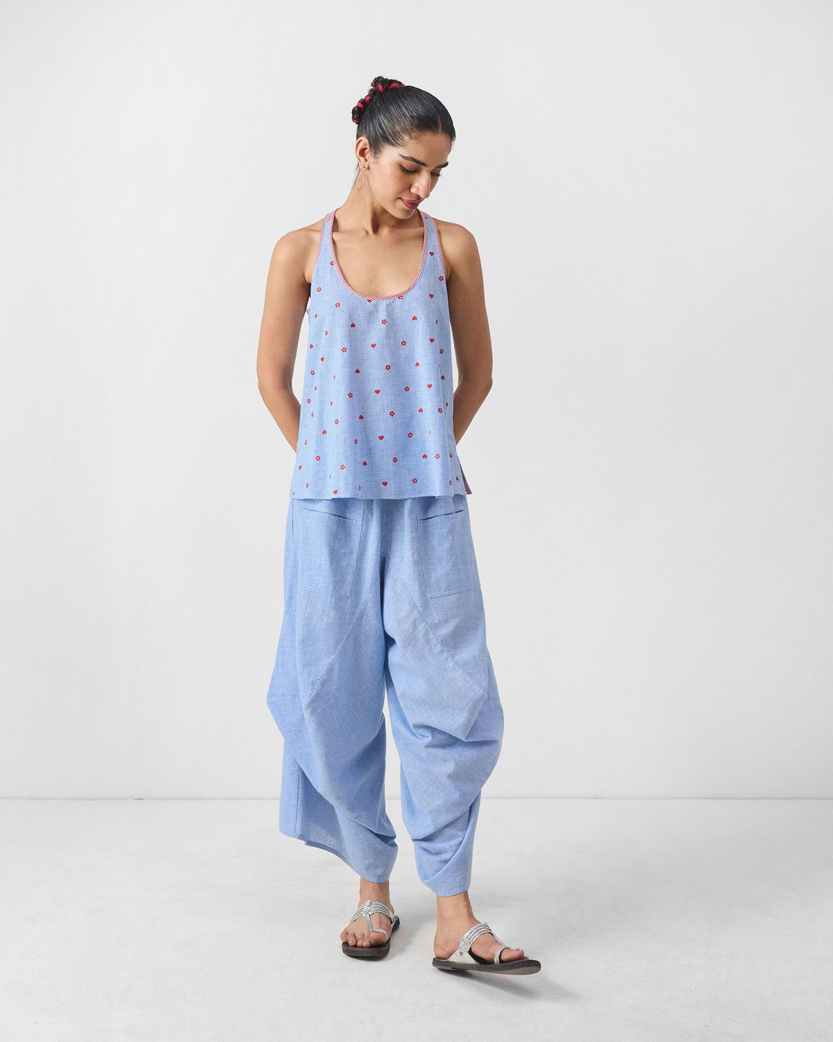 Blue and white checked Yoka trousers with front pockets and a cropped hem.