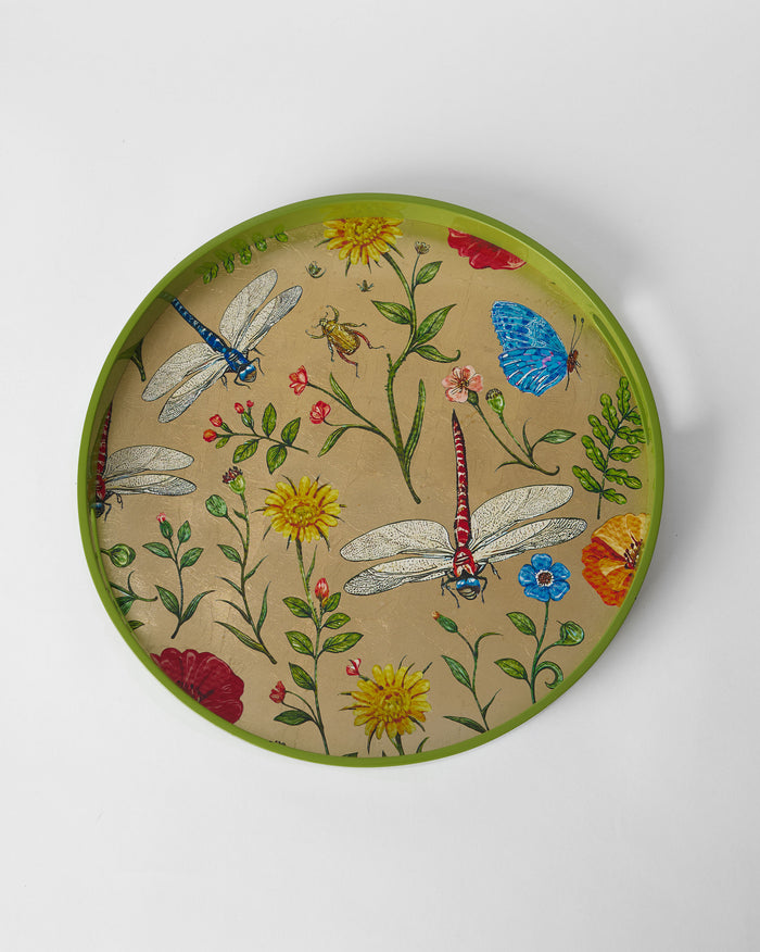Bloom round tray with a lime green rim and dragonfly and wildflower motifs.