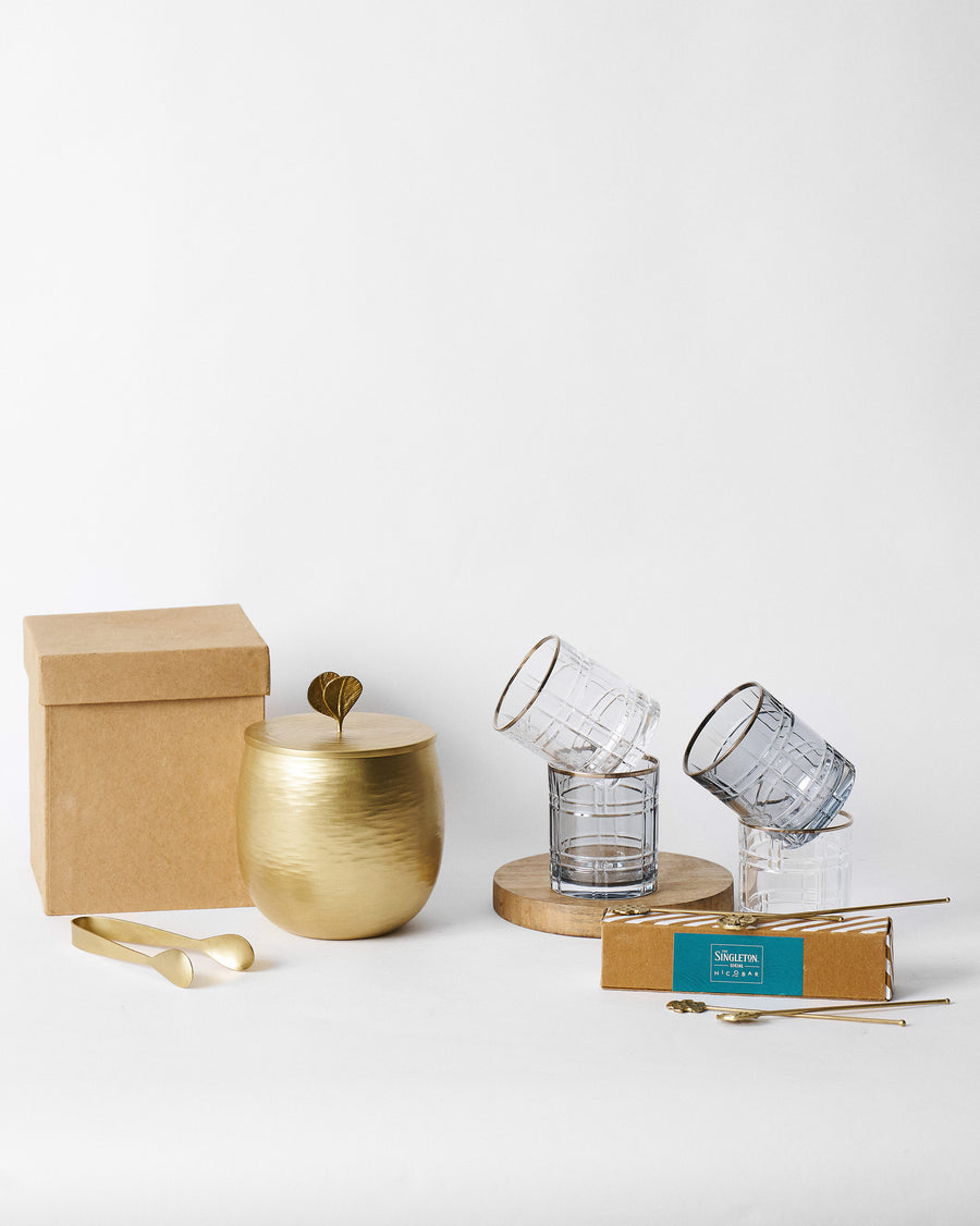 The Celeste Bar Set beside its gift boxes.