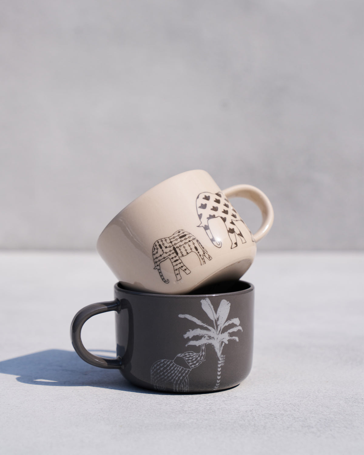 Patterned elephants on the cream mug.