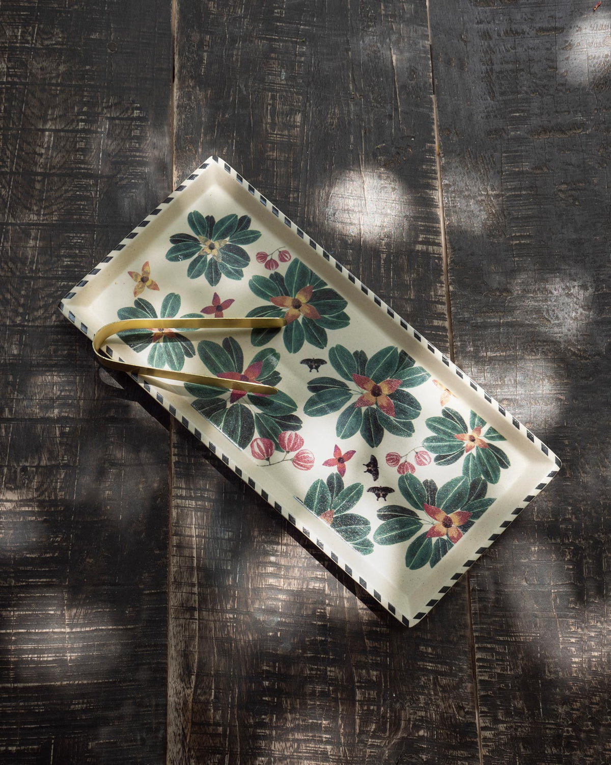 Flora cookie tray from the Tea and Coffee Set with brass tongs.