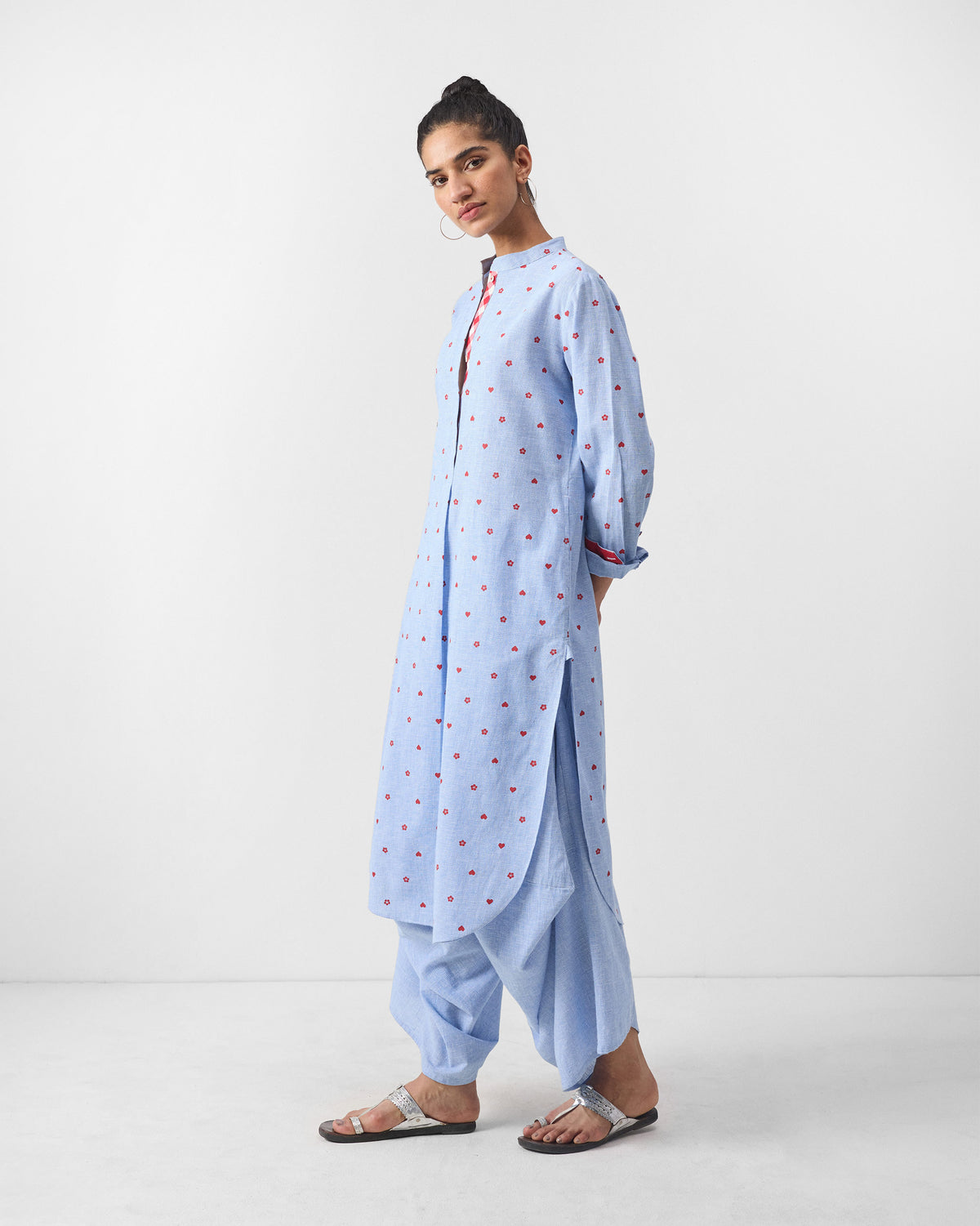 Side view of a light blue Sakura set kurta with a side slit.