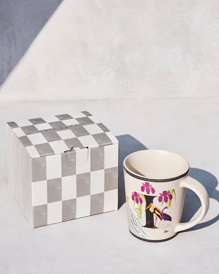 The Imli Mug beside its chequered Nicobar gift box.