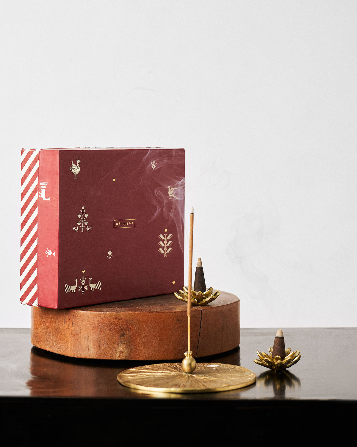Garden Essence set with maroon gift box, brass incense tray and lotus holders.