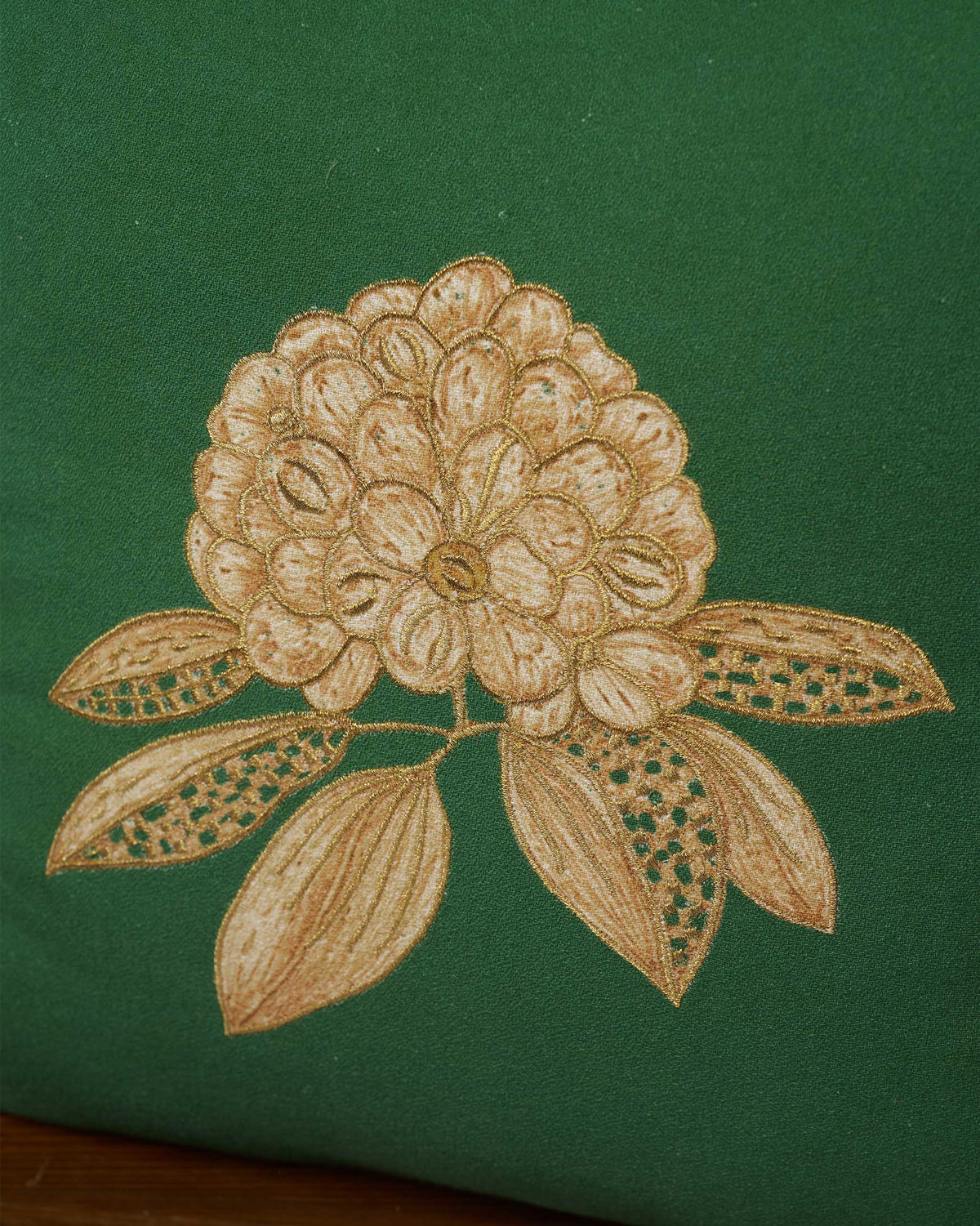 The embroidered bloom.