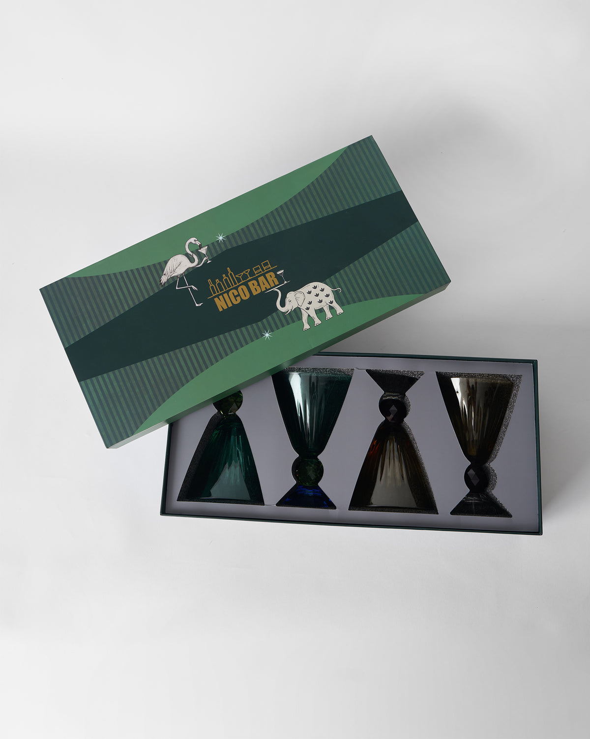 Open Nico Bar gift box holding four Vira cocktail glasses.