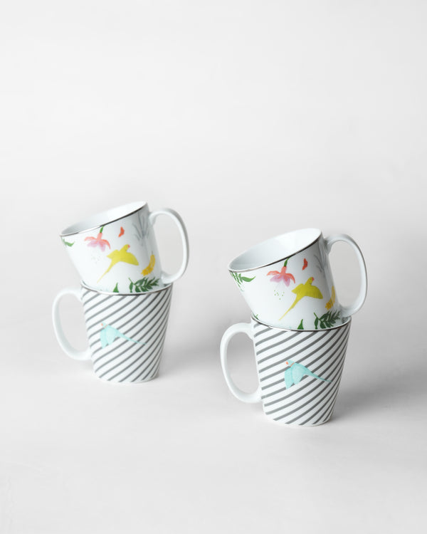 Mugs stacked in pairs, parrots on top and stripes below