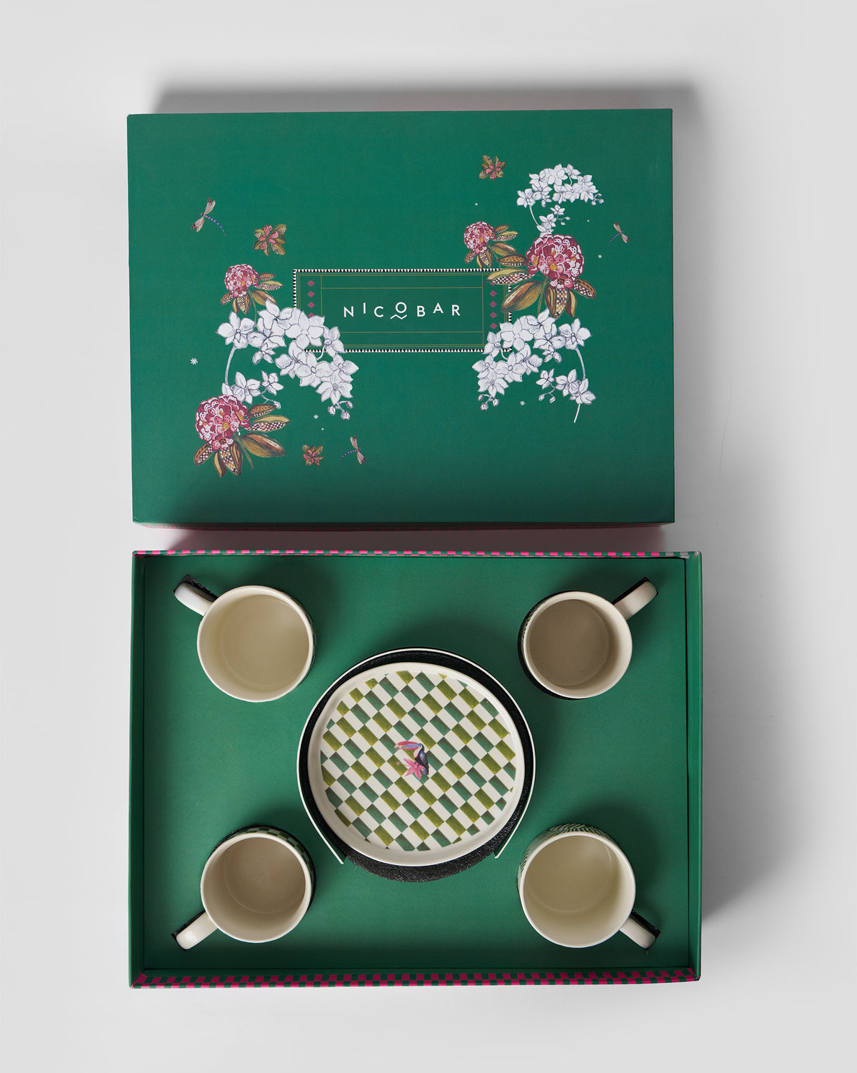 Open Hornbill gift set box with four mugs and a green check plate nested inside.