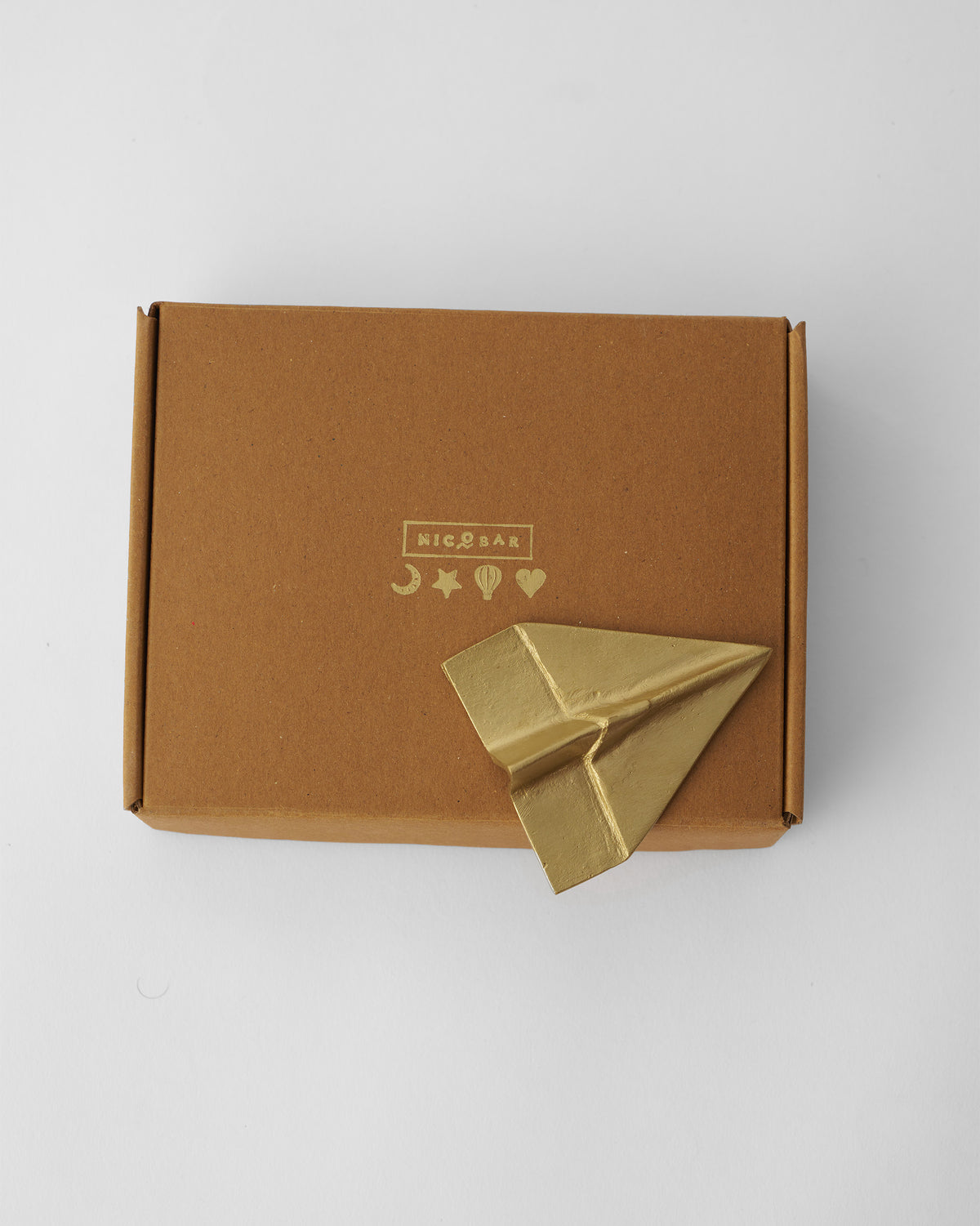 The plane on its kraft box.