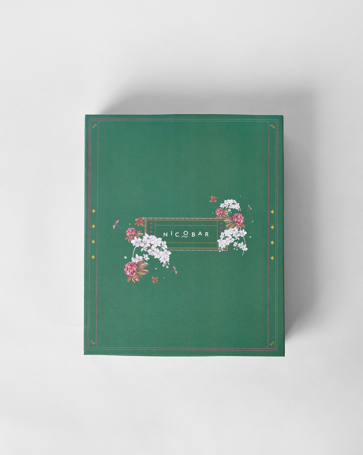 Closed green floral gift box for the Taal incense and diya set.