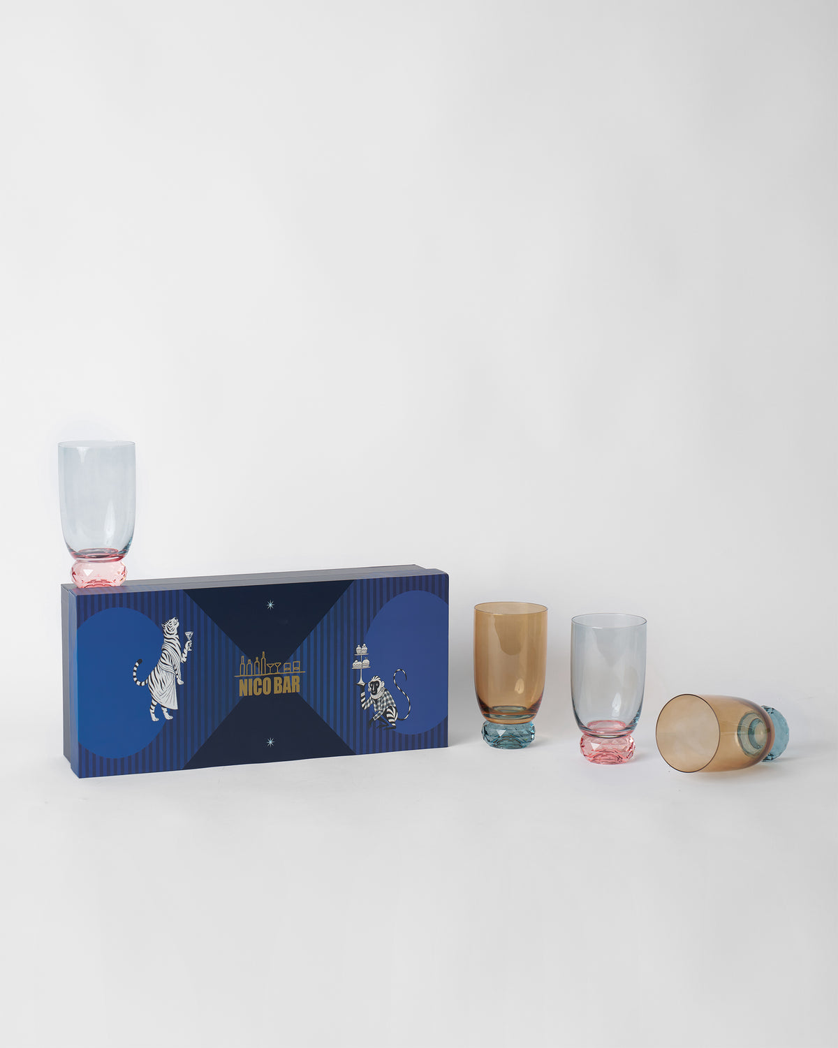 Reva sharbat glass set of four with a navy Nico Bar gift box.