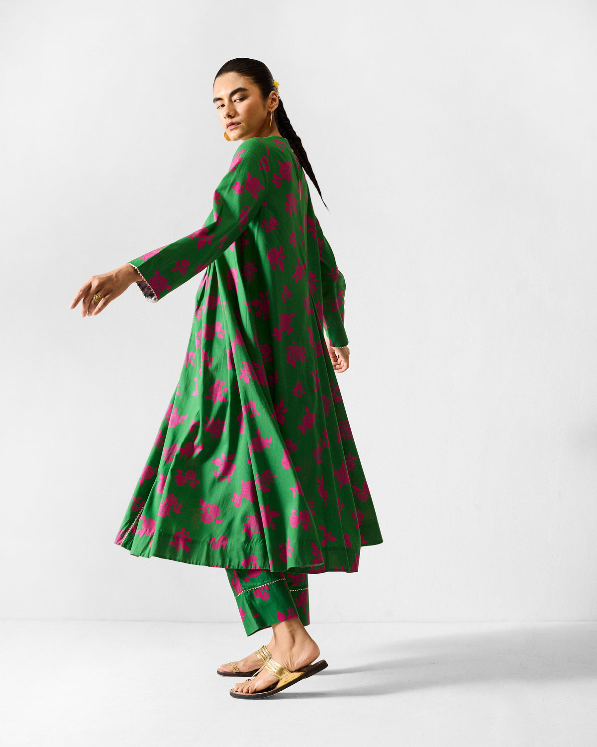 Green Ayat kurta set with pink florals showing a flared A-line silhouette.