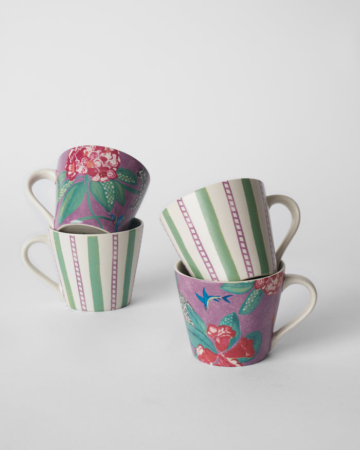 Buransh Espresso Mugs stacked in floral purple and green stripe pairs.