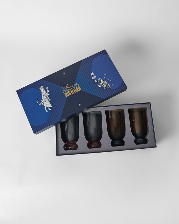 The lid lifted over four glasses in their slots