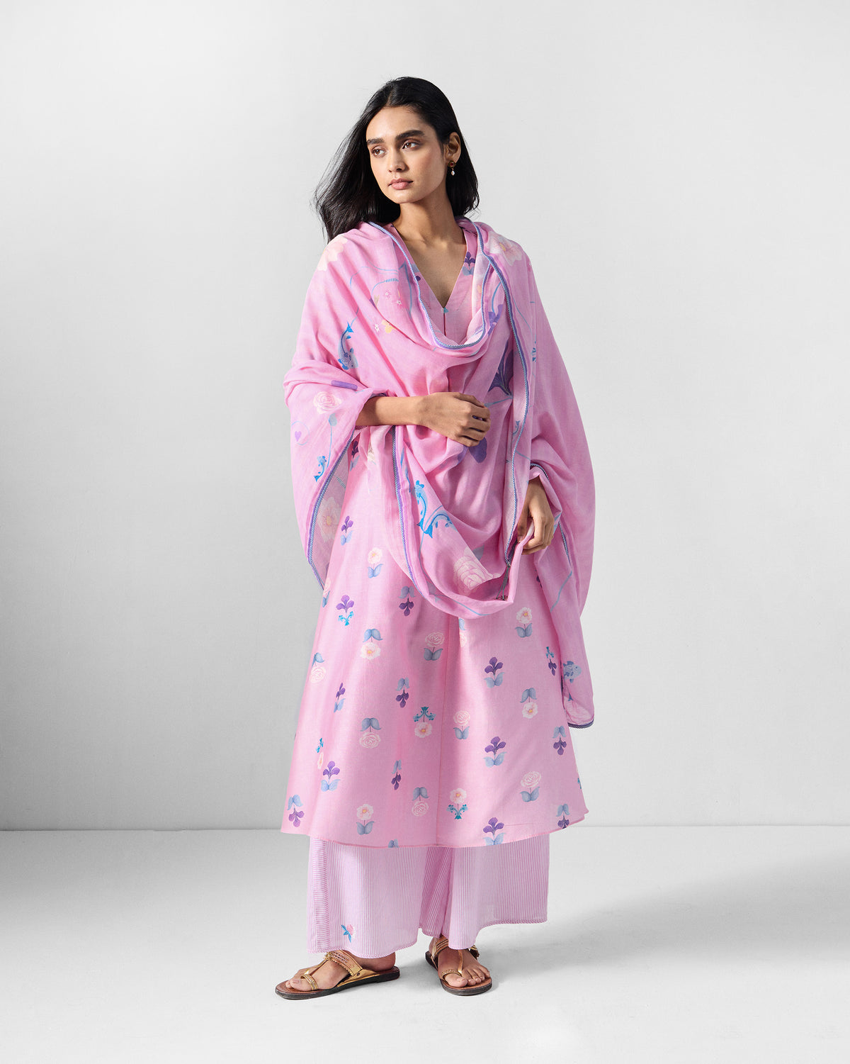 Pink floral Hera Kurta Set worn with a matching pink dupatta.