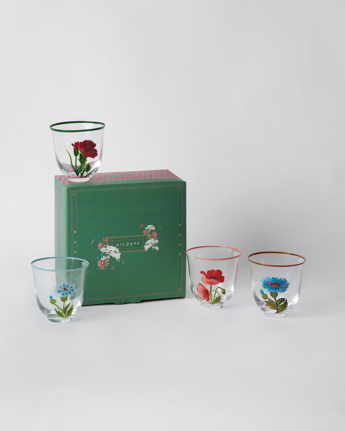 Rit tumbler set of four with a green Nicobar floral gift box.