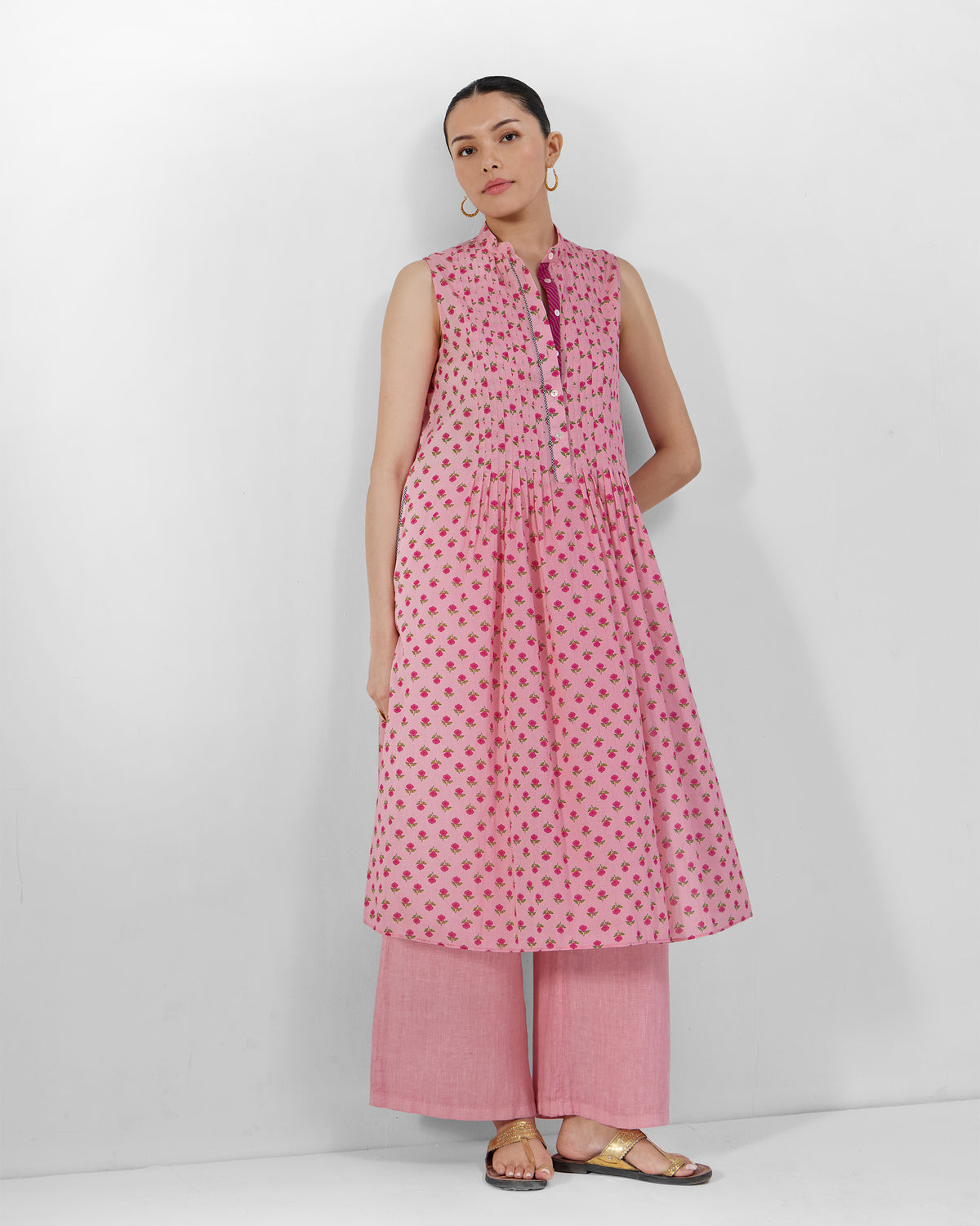 Person wearing a pink floral Summer Fun kurta set with wide-leg pants.