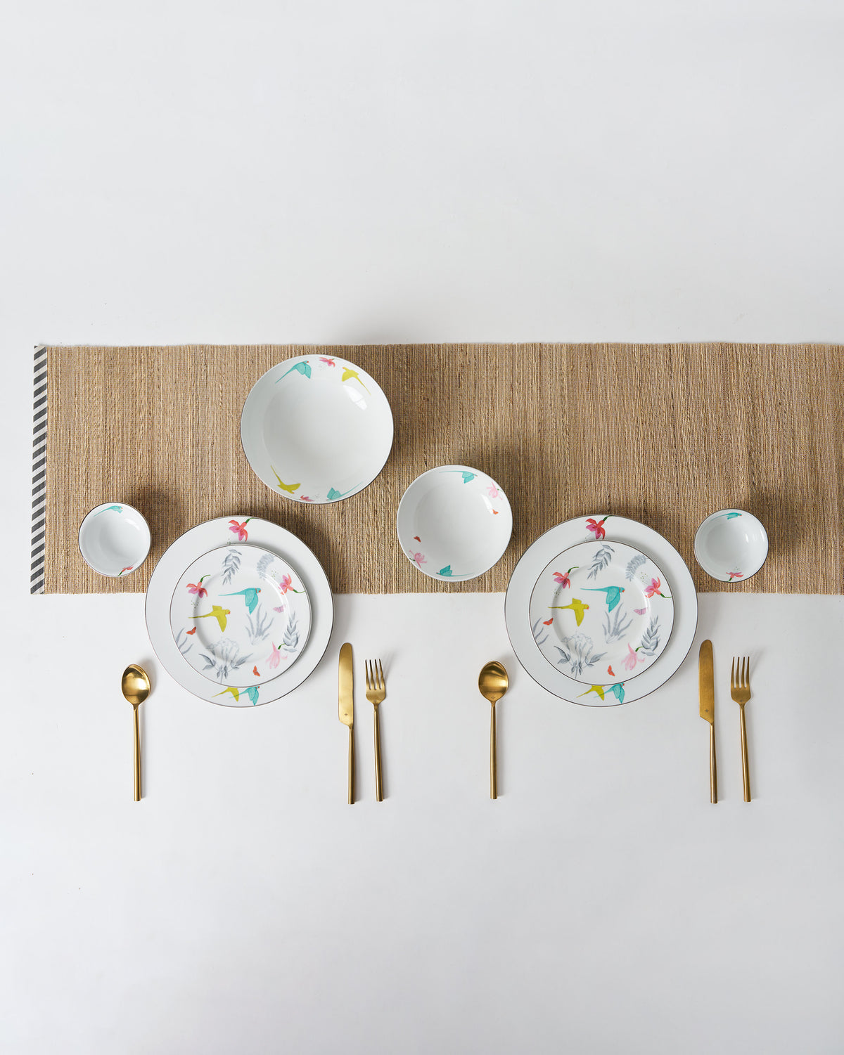 The Botanical dinner set laid for two.