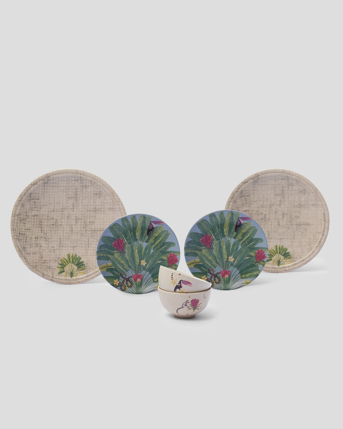 Madagascar dinner set with cane plates, tropical plates, and toucan bowls.