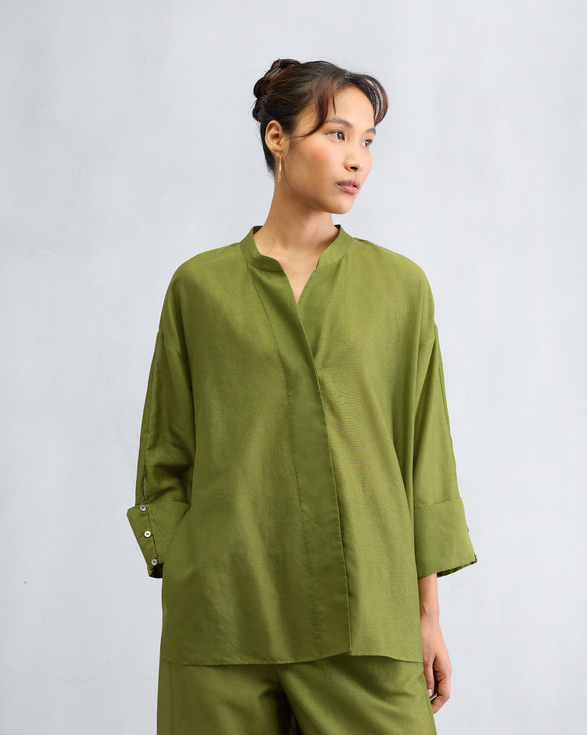 Person wearing the Cirrus Shirt Set, shown from the waist up.