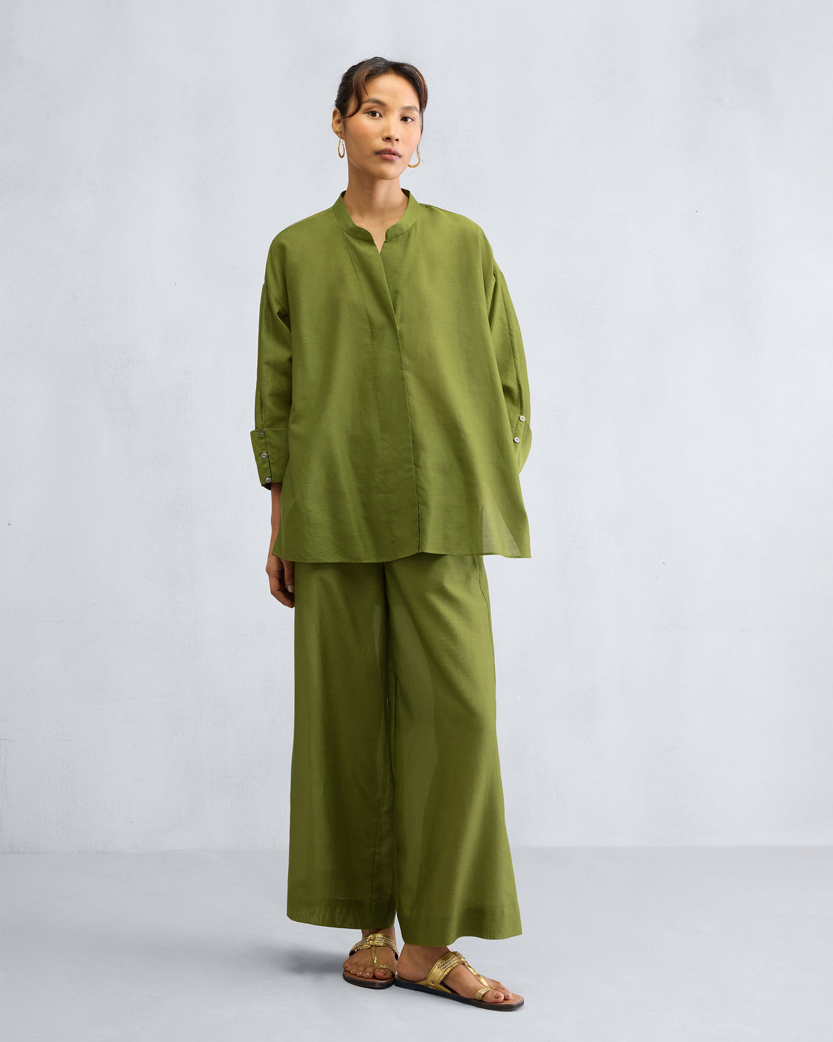 Full-length view of the Cirrus Shirt Set worn by a person.
