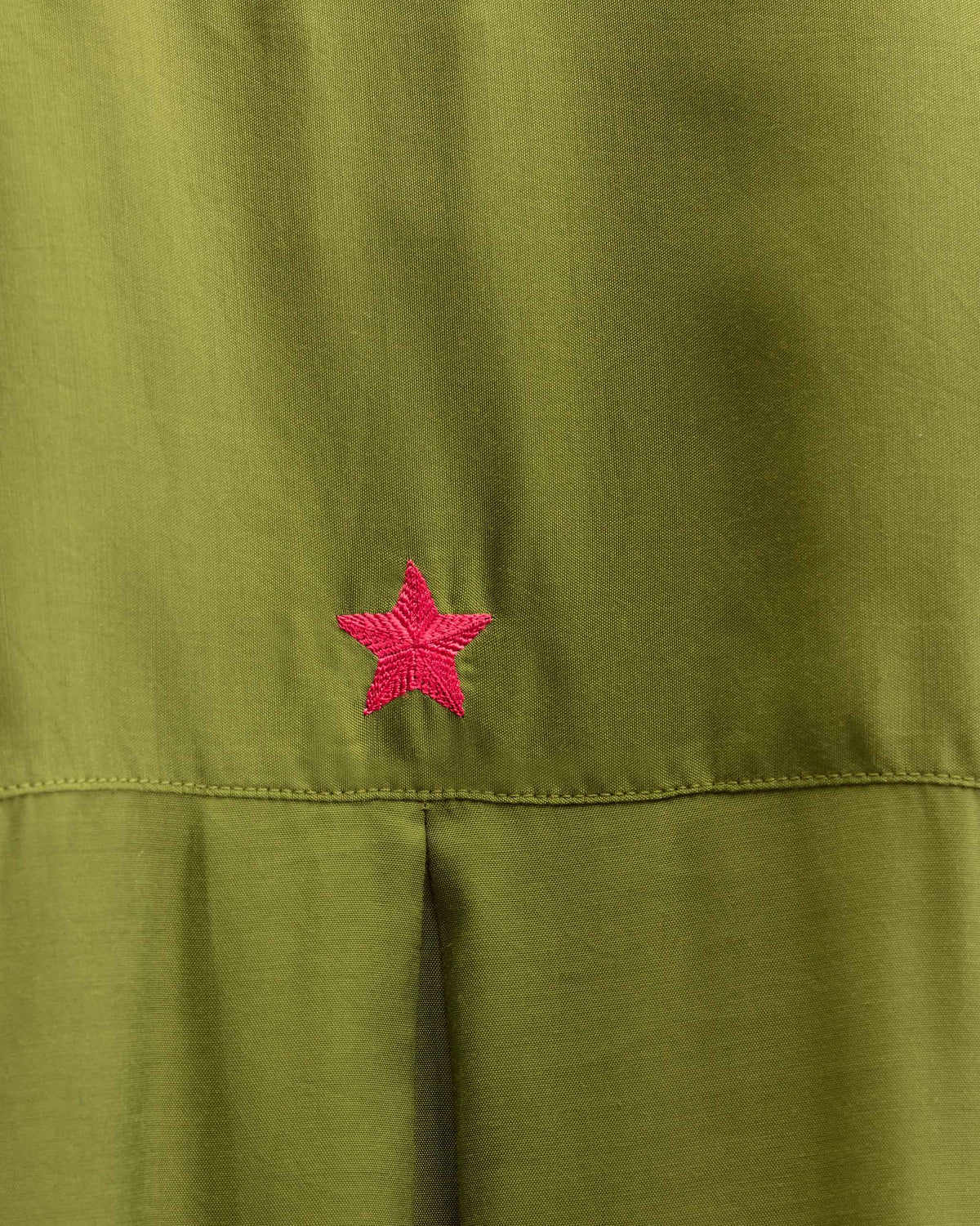 Close-up of the Lazy Sunday Tunic Set showing a red star embroidery.