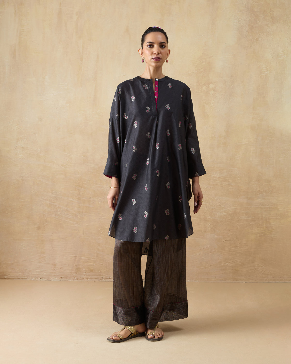Charcoal Lazy Sunday tunic with a fuchsia placket and bronze wide-leg pants.