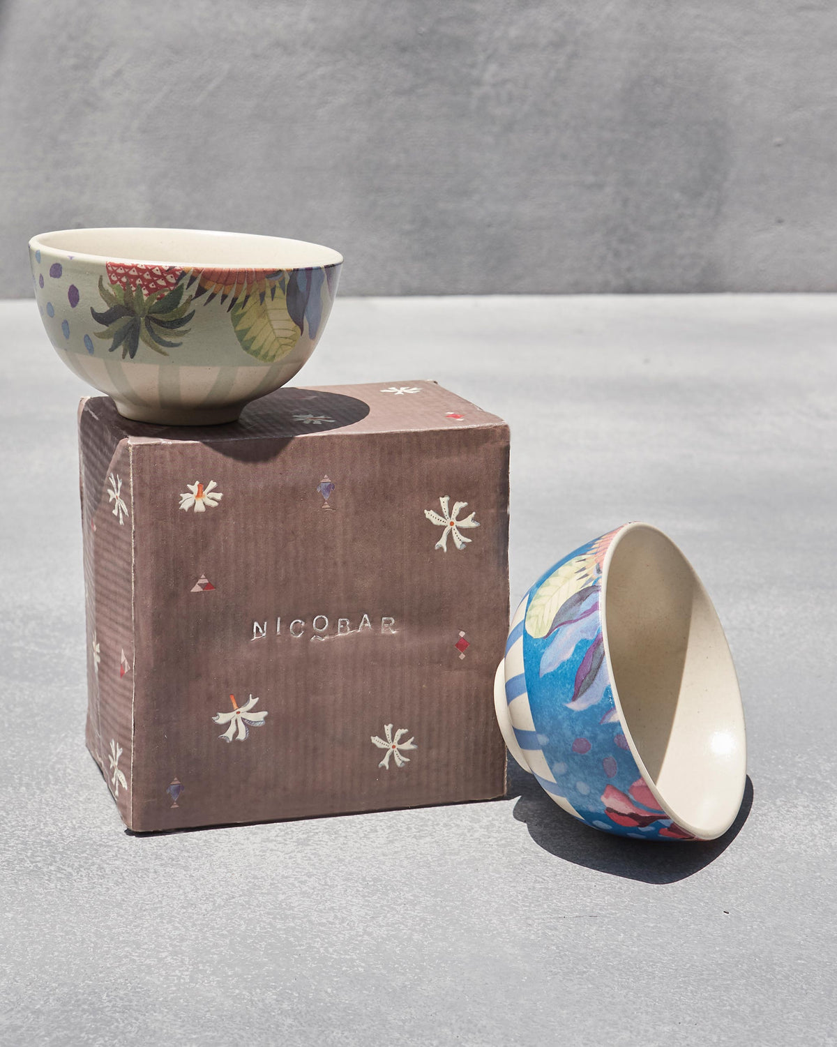 Mahi nibble bowls with a Nicobar box, one bowl resting on top of it.