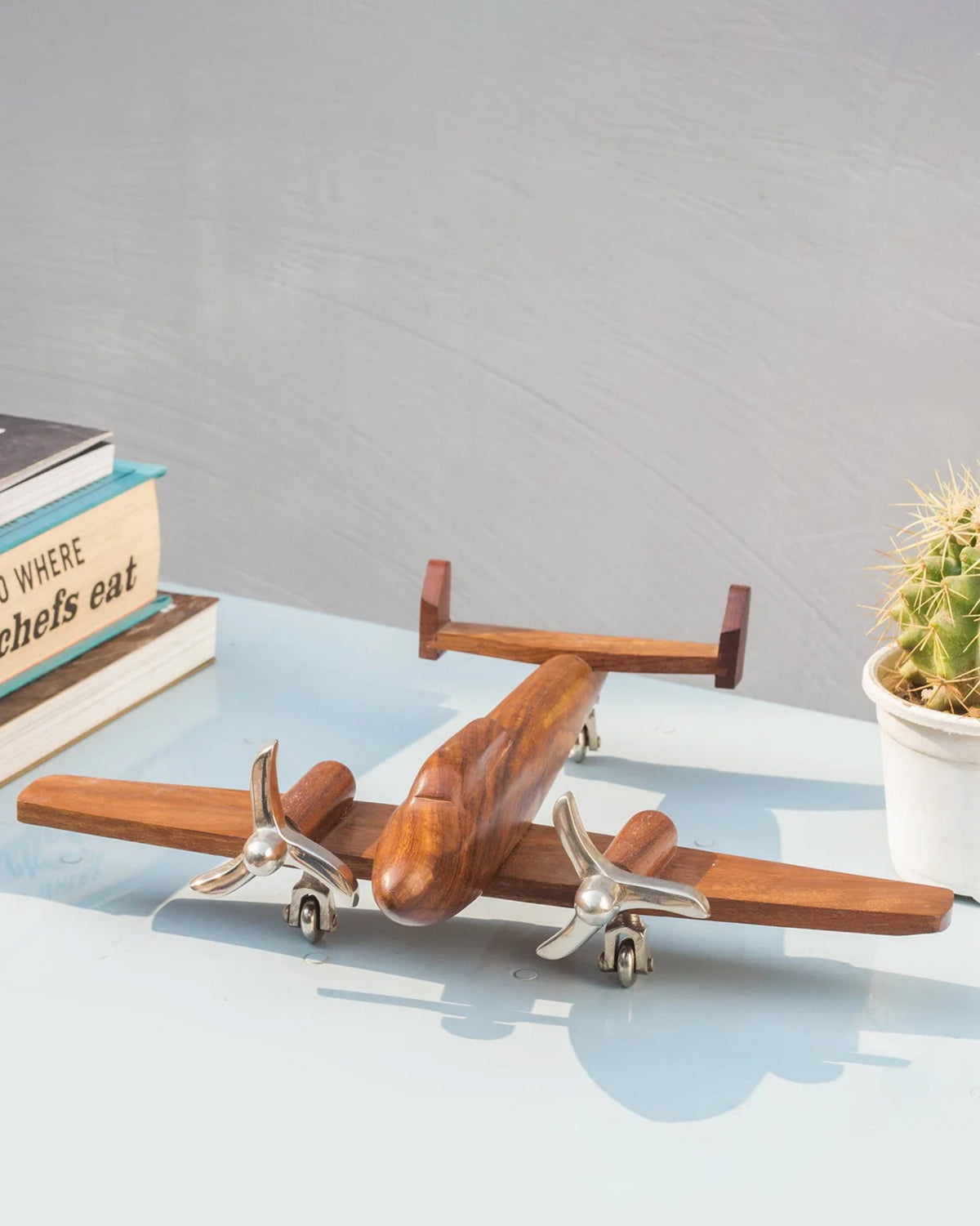 Beufort airplane with silver-finish propellers and a wooden body.