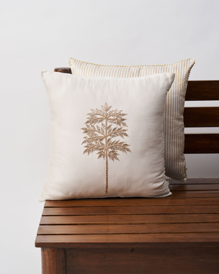 Golden Palm Cushion Cover in cream with a gold embroidered palm motif.