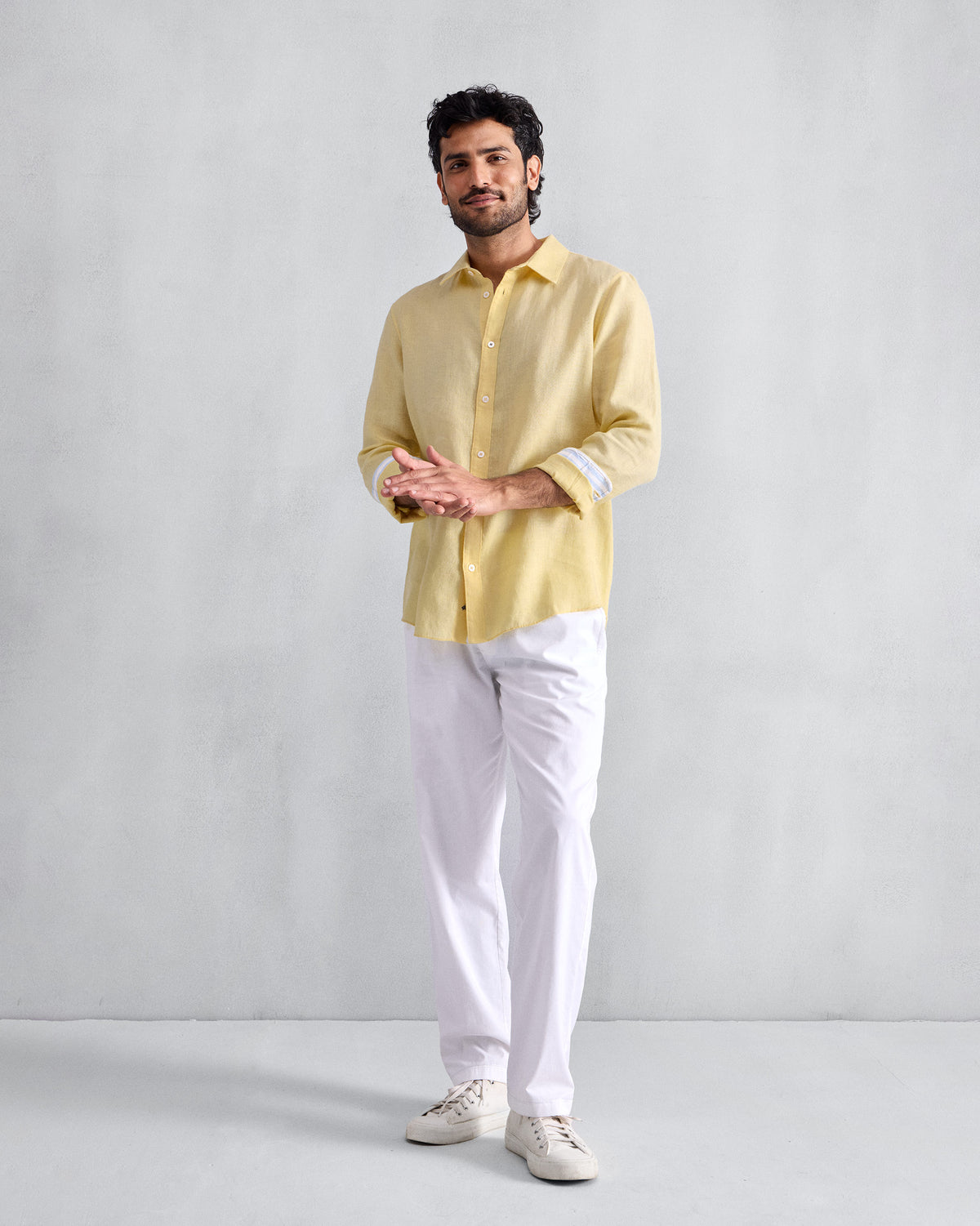 White Shillong jammies worn full length with a straight-leg fit.