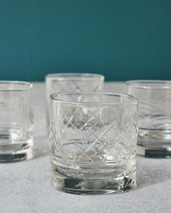Close view of a glass with a diamond lattice etch