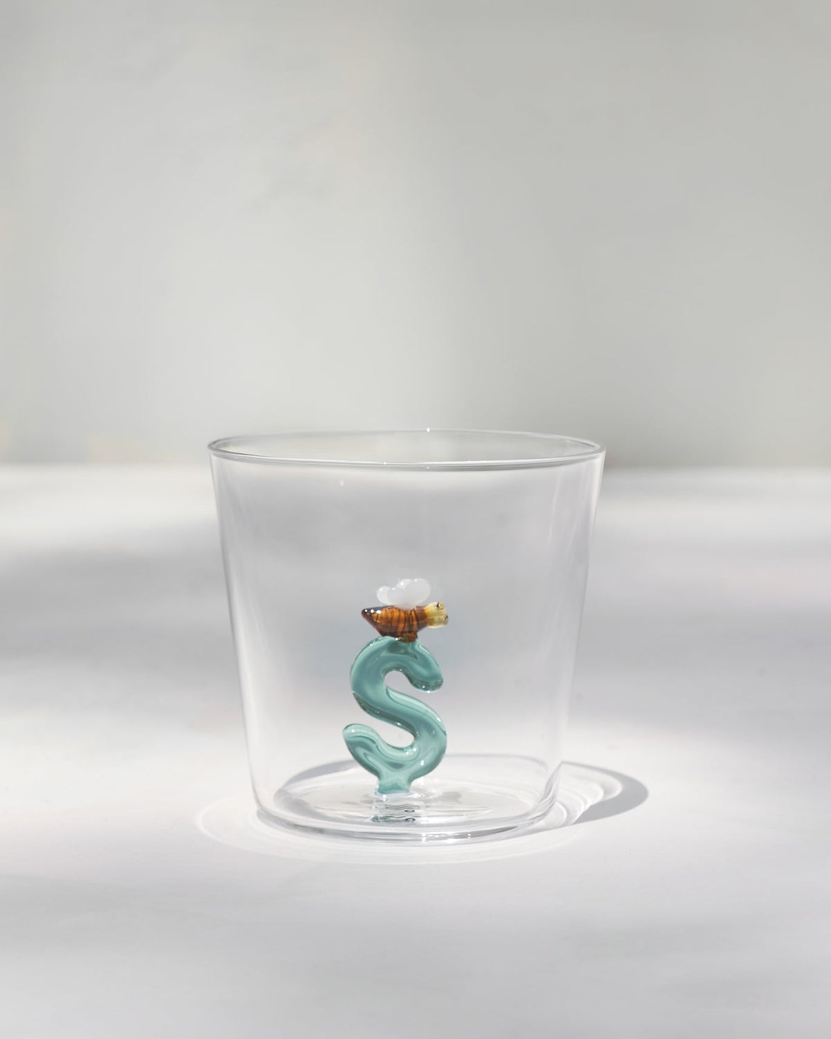 Clear Alphabet S glass with a letter S and a bee.