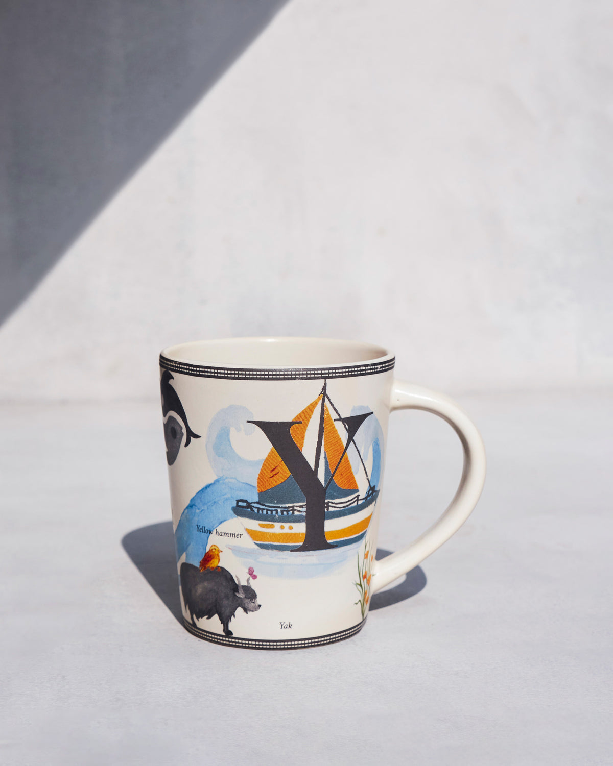 The charcoal Y with a sailing boat.