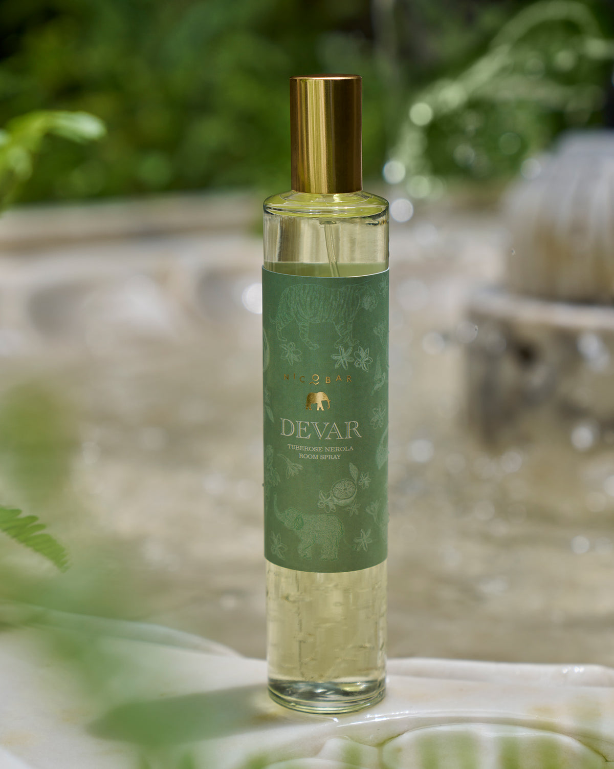 Devar Tuberose Neroli room spray bottle with a gold cap and green label.