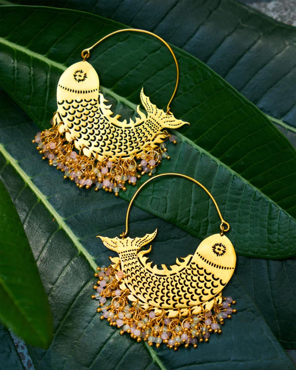Pair of gold Meen Bali showing fish-scale texture and beaded drops.