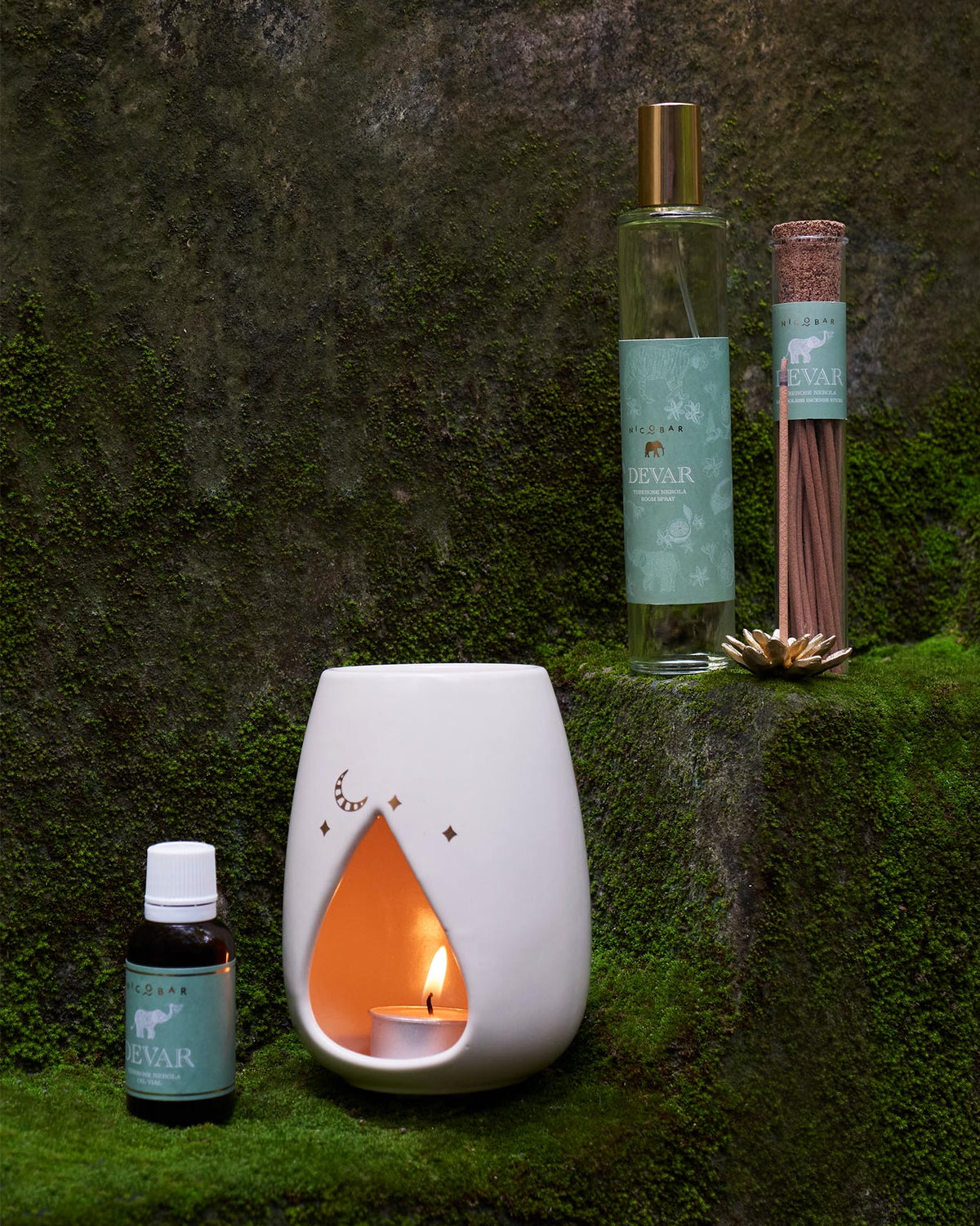 Woodland Gift Set items laid out on grey, including a room spray and incense sticks.
