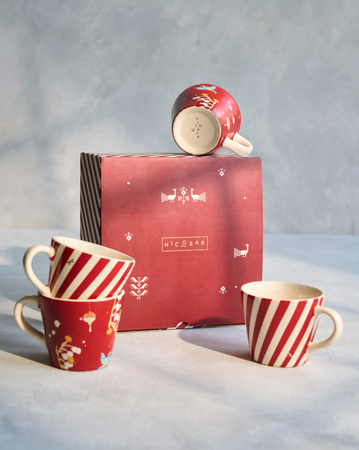 Phoenix espresso mug set of four with red stripes, bird print, and gift box.