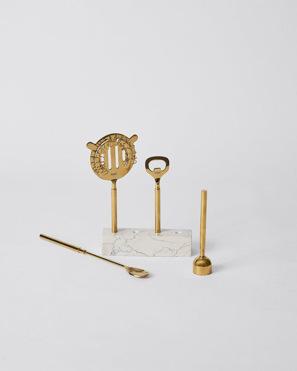 The tools on a marble stand, the spoon laid in front