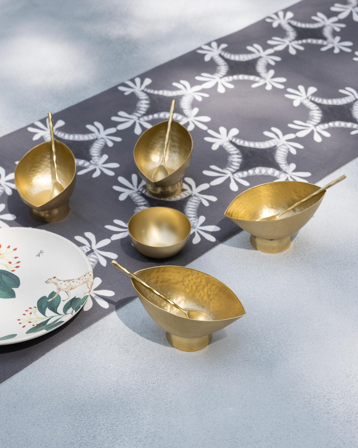 Chakra Gelato Cups with spoons arranged on a patterned table runner.
