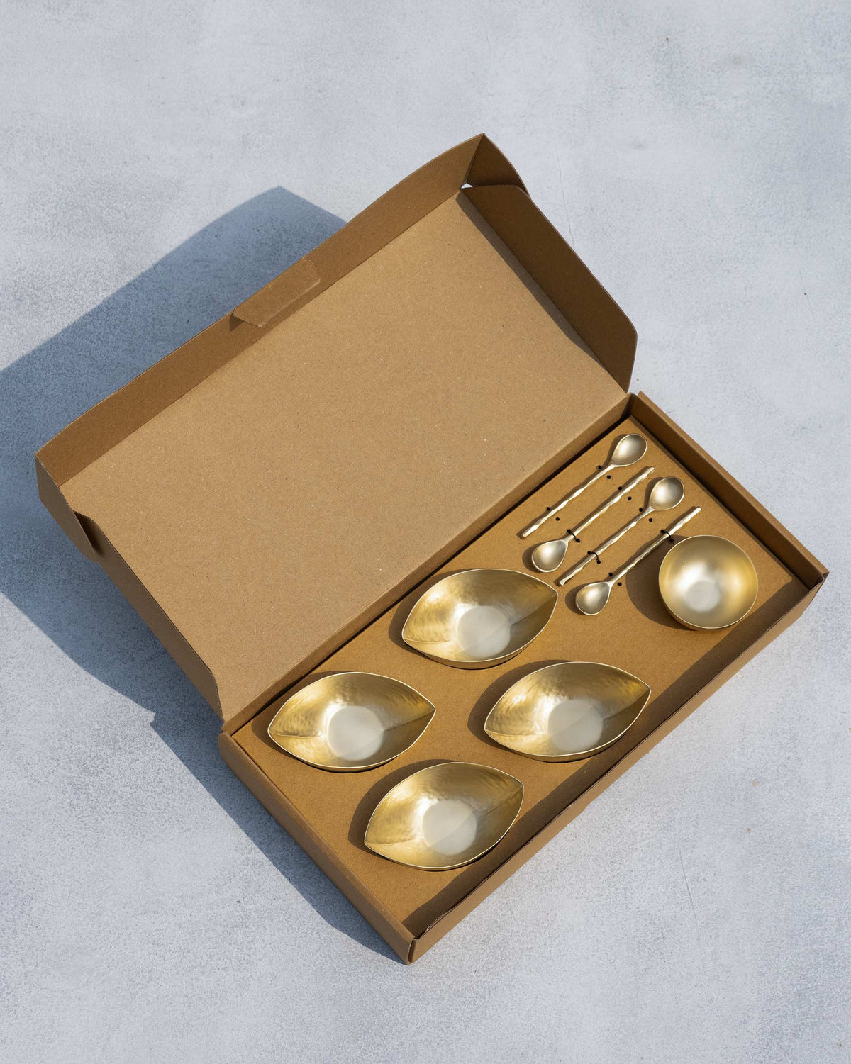 Chakra Gelato Cup set packed in an open gift box with spoons.